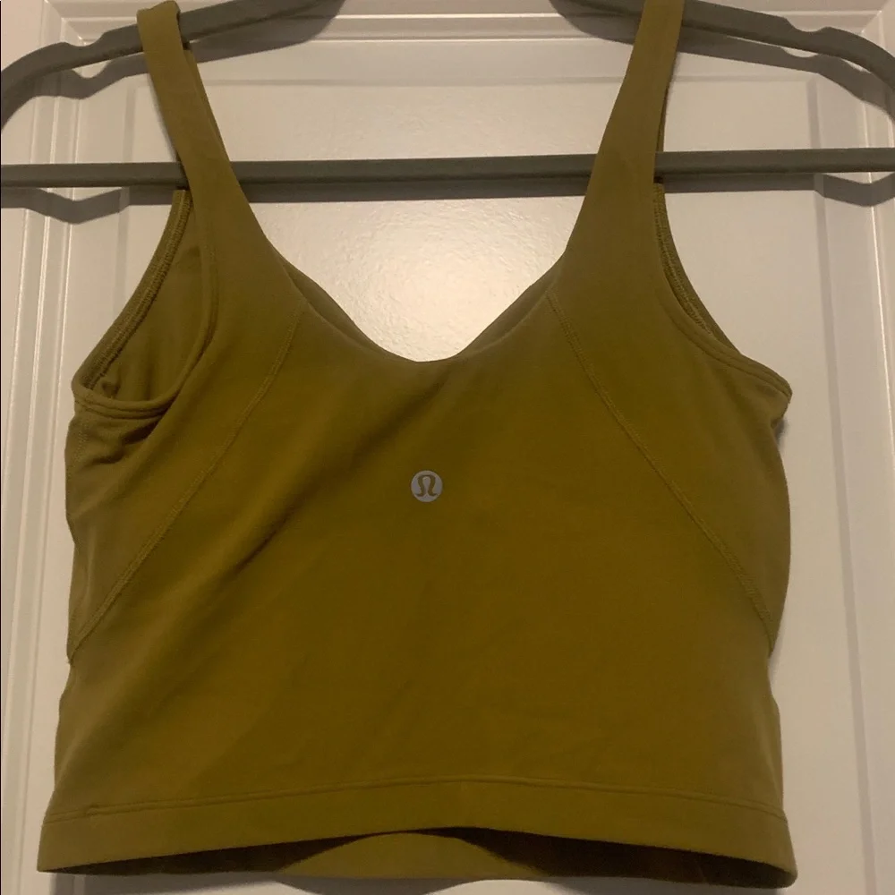 Lululemon Green Align Tank, Sz 4, no pads
FLAW in the front small hole pictured - Picture 3 of 5